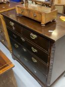 George III mahogany chest of two short and three long drawers with cock beading, canted side and