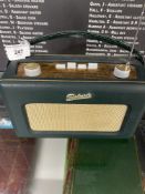 Roberts 'Revival' Radio, green leather case model no. R 250. Black and silver label to inside