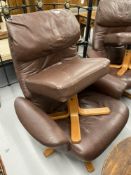 20th cent. Leather effect recliners with footstools - a pair.