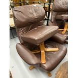 20th cent. Leather effect recliners with footstools - a pair.