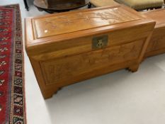 20th cent. Chinese hardwood chest the panels carved with bamboo relief on step bracket supports.