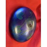 20th cent. Glass: John Ditchfield cobalt blue studio glass disc paperweight decorated with a lily