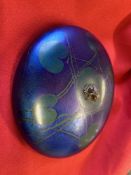 20th cent. Glass: John Ditchfield cobalt blue studio glass disc paperweight decorated with a lily