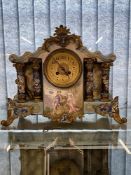 Clocks: Early 20th cent. French ceramic mantel clock with cloisonne columns and inset decoration.