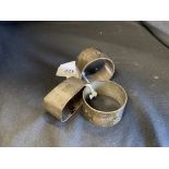 Hallmarked Silver: Napkin rings (3), two hallmarked London and one Birmingham. Weight of the three