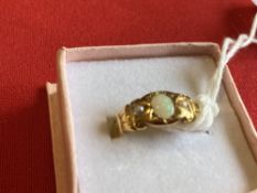 Hallmarked Jewellery: 22ct. Gold ring set with an oval opal and two seed pearls. Weight 3·9g.