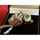 Hallmarked Jewellery: Two hallmarked 9ct. gold rings, one set with a rectangular jade with a diamond