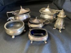 Hallmarked Silver: Condiments, three mustard pots, two salts and one pepper pot. Hallmarked London