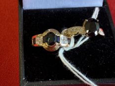 Jewellery: Two yellow metal rings, one set with five sapphires and eight diamonds, the other with