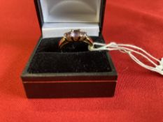 Hallmarked Jewellery: 9ct. Gold ring set with three amethyst, estimated weight of (3) 0·50ct.