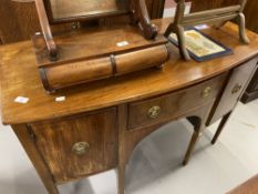 19th cent. Mahogany bow front sideboard, fitted central drawer flanked by a pair of panel doors on