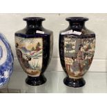 Ceramics: 19th cent. Japanese vases, cobalt blue ground decorated with Geishas panels. 10ins. One