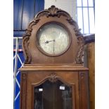 Clocks: Late 19th/early 20th cent. German oak three chain longcase clock, 11in. silvered dial with