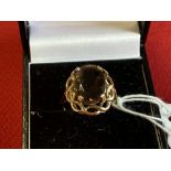 Hallmarked Jewellery: 9ct. Gold ring set with an oval citrine, hallmarked London convention mark.