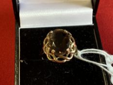 Hallmarked Jewellery: 9ct. Gold ring set with an oval citrine, hallmarked London convention mark.