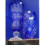 20th cent. Glassware: Blue overlay cut glass vase with flower spray panels. 11in. Blue overlay cut