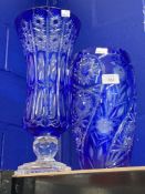 20th cent. Glassware: Blue overlay cut glass vase with flower spray panels. 11in. Blue overlay cut