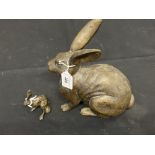 20th cent. Brass figure of a crouching hare 6ins. and a smaller model of a March hare 2½in.