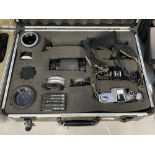 Photographic Equipment: Analogue aluminium case containing a Canon AT-1 camera body, a Canon A-1