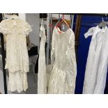 Fashion: Art deco style embossed white satin wedding dress, boat shape neck, long sleeves six button