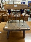 19th cent. Elm child's/dolls spindle back chair. 15in.