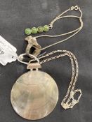 Jewellery: White metal, one necklet with a shell pendant, one ring and one pendant. All tests as