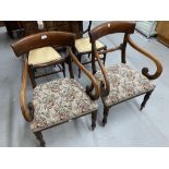 Early 19th cent. Mahogany bar back armchairs on sabre supports at the back and tapering supports