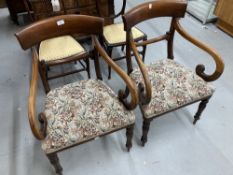 Early 19th cent. Mahogany bar back armchairs on sabre supports at the back and tapering supports