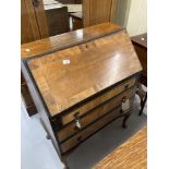 20th cent. Mahogany drop front inlaid bureau on cabriole supports.
