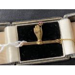 Gold Jewellery: 15ct. and 625 Chester hallmarked hand of Fatima bar brooch set with red stone.