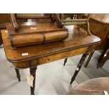 19th cent. Mahogany fold over tea table on turned supports.