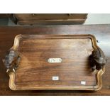 Late 19th/early 20th cent. Hardwood tray decorated with elephants. Inset ebony/ivory panel bearing