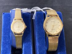 Watches: Lady's and Gent's Sekonda quartz watches, gold plated case and bracelet.