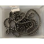 Mid 20th cent. Costume Jewellery: Necklets, four hematite beads of various sizes.