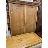 20th cent. Stripped pine wardrobe with drawer.
