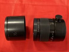 Photographic Equipment: Rubinar MC 500mm f5·6 Macro lens with sepia filter and case.