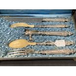 White metal five piece carving set in fitted case, retailed by C. Detouche, Paris. Tests as
