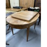 19th cent. Biedermeier style birch oval dining table with one leaf, on tapered supports. 55ins. x