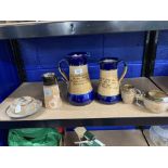 Royal Doulton: Waisted jugs, cobalt blue rim and base, with motto 'The Wisest of People' etc. 10ins.