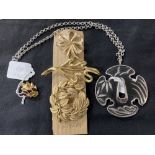 Mid 20th cent. Designer Jewellery: Trifari, white metal "Tsuba" with black inlay pendant and