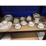 19th cent. part Staffordshire possibly Coalport part tea service, comprising Colbalt blue, with vine