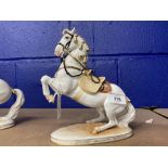20th cent. Ceramics: Augarten Spanish riding school figurine 'Leuade' riderless rearing horse.