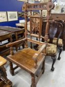 19th cent. Oak Gothic style elbow chair, turned and fretwork back and supports.