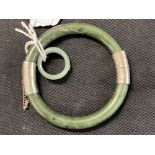 Jewellery: Oriental Chinese jade bangle with silver fittings and a jade ring as a entwined band with