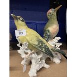 20th cent. Ceramics: Karl Ens bird ornaments Golden Oriel on tree stump. 7½ins. Green Woodpecker