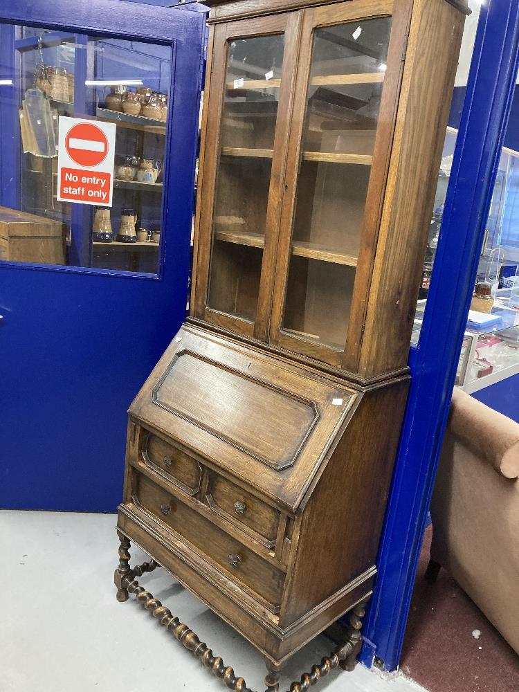 20th cent. Oak bureau bookcase with glazed top and turned stretchers.