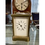 Early 20th cent. carriage clock with brass case, white metal face, Roman numerals, trade mark for
