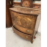 20th cent. Bow front mahogany cupboard with two drawers. 26ins.