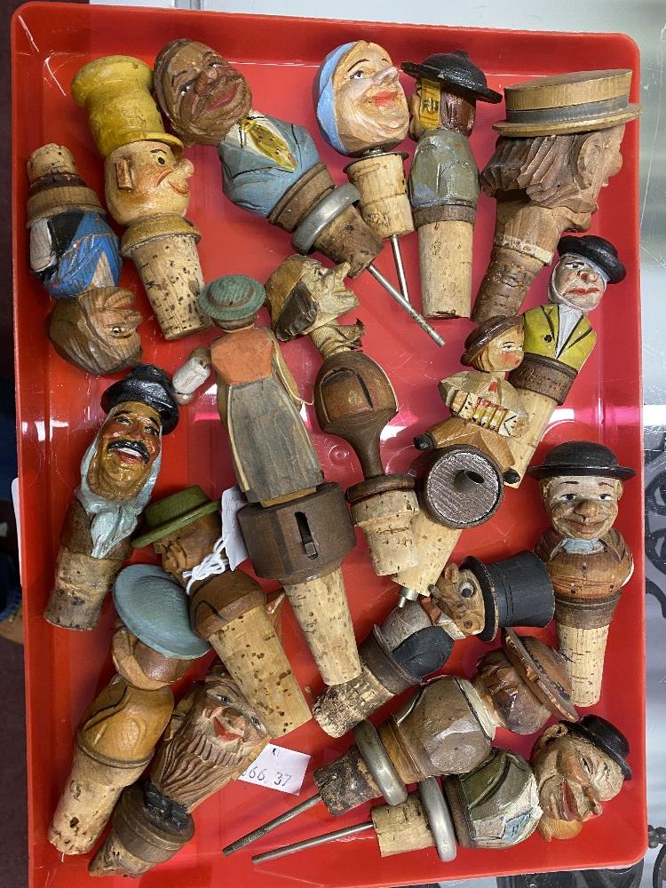 Breweriana: 20th cent. Novelty cork bottle stoppers with carved grotesque & humorous treen