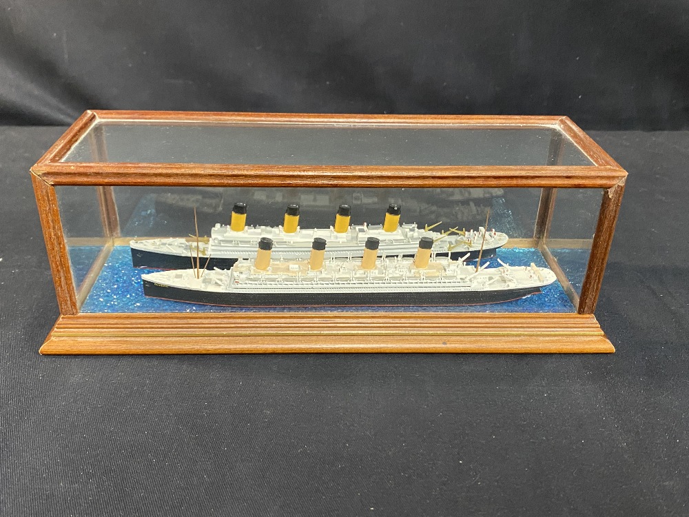 R.M.S. TITANIC: Models of Titanic and Olympic in a glazed case. 10ins.